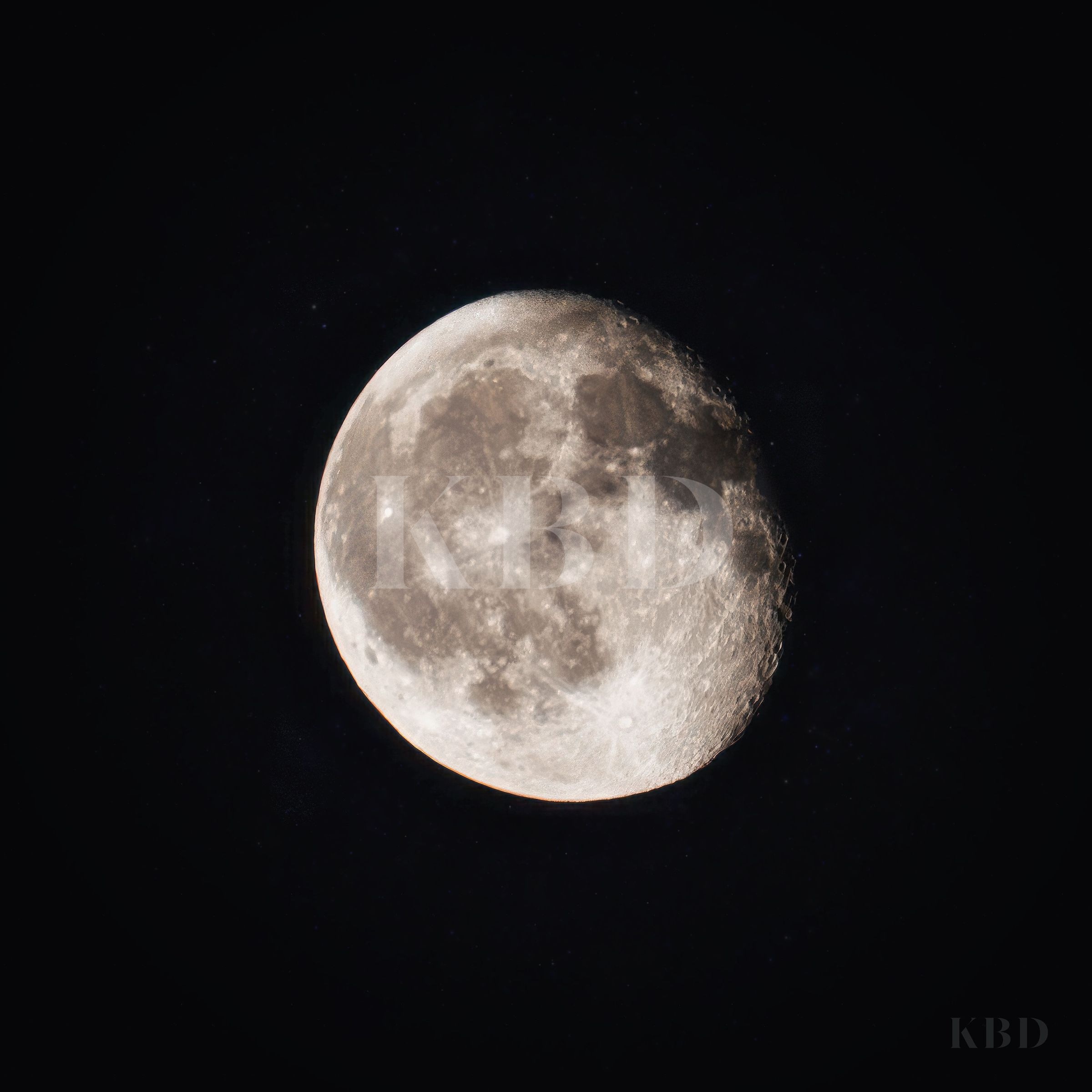 Detailed close up photograph of a waning gibbous moon showing the terminator line and crater shadows against a black night sky.